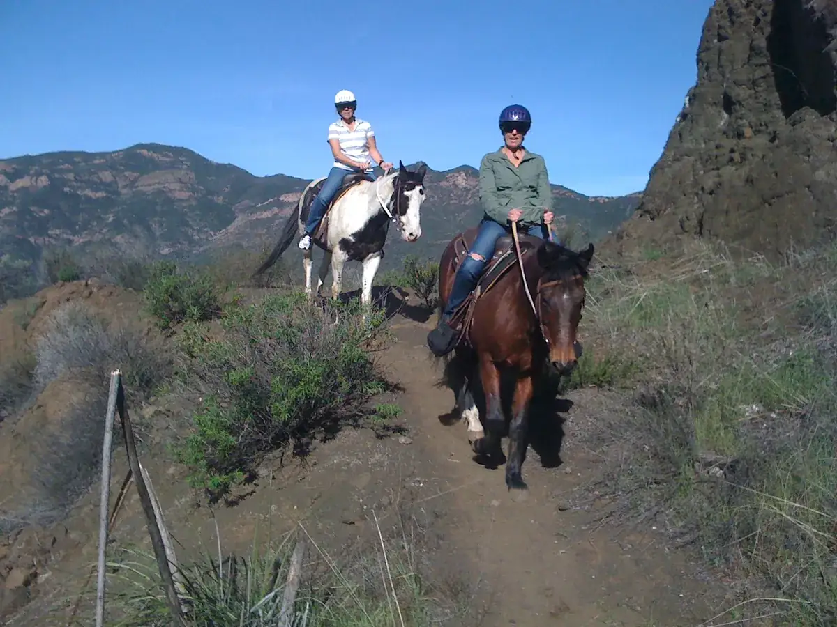 Two riders on the rocky trail
